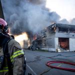 A large fire raging at a storage site for electric scooters on Nieuwe Hemweg in Amsterdam‑Westpoort, producing thick smoke, March 20, 2026. 