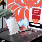 A voter casting their ballot in Amsterdam for the municipal elections on 18 March 2026