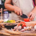 Woman prepping food in a kitchen
