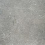 A lavasteen gietvloer, a type of flooring that mixes volcanic rock to look like concrete