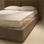 Mattress, boxspring, and headboard in a bedroom