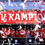 Players of PSV with the championship trophy during the team’s celebration at Stadhuisplein. The club has won the Eredivisie title for the third consecutive time, marking their 27th national championship.