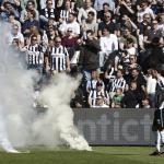 Heracles supporters throw fireworks onto the pitch during the Dutch Eredivisie match between Heracles Almelo and FC Volendam at Erve Asito Stadium on April 26, 2026, in Almelo, Netherlands.