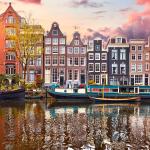 Apartments, businesses, and hotels along the Singel in Amsterdam. June 2025