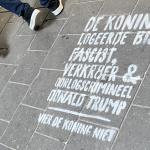 A protest message outside the Muiderpoort Station in Amsterdam criticizing King Willem-Alexander for his State visit with U.S. President Donald Trump. 27 April 2026