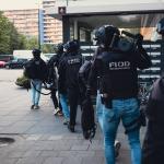 Cargo HARC-team officers during cocaine smuggling investigation linked to Schiphol Airport. 2026