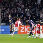 Ajax players celebrate Mika Godts' injury time equalizer against PSV, May 2, 2026.