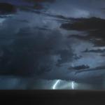 A thunderstorm with lightning. 