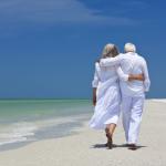 An elderly couple at a beach.