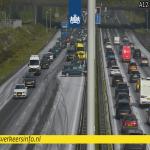 Paramedics respond to a crash during a hailstorm on the westbound A12 near Maarsbergen, Utrecht. 13 May 2026