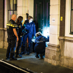 Police investigate a firebomb attack on the D66 party headquarters in The Hague, 7 May 2026