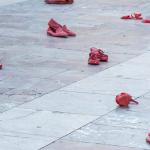 Red shoes placed in a protest to represent the victims of femicide 