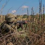 An undated photo of a Ukrainian solider preparing to fire an AK-47 rifle.