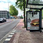 Burger King's 'Veggie Burger' ad at a bus station in Amsterdam. June 4, 2026.