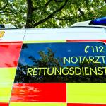 ASB Rettungsdienst ambulance parked outdoors, showing medical assistance and 112 emergency number