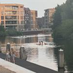 People swim and sunbathe on the Oude IJssel in Doetinchem. June 26, 2026.