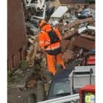 A USAR search team member working with a dog at the scene of an explosion on Osdorper Ban in Amsterdam. 12 June 2026