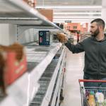 Empty grocery stores shelf. Undated.