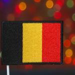 A patch of the Belgian flag against an evening background