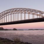 The Waalbrug seen from the Nijmegen Bloxx on Waalkade. 19 Nov. 2022