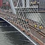 Rescue workers raced to the scene where a tram rear-ended a second tram on the Erasmus Bridge in Rotterdam, leaving 15 hurt. 22 July 2026