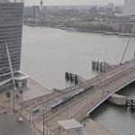 Two trams limp away from the Erasmus Bridge in Rotterdam after a collision injured 15 people. 22 July 2026