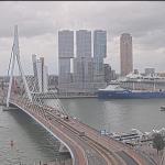 A screenshot from Rotterdam's live webcam shows emergency service vehicles filling the Erasmus Bridge after two RET trams collided. 15 people were hurt, including 7 neeing hospital treatment. 22 July 2026