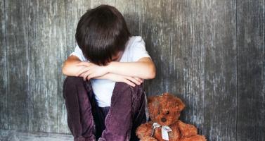 Child with teddy bear