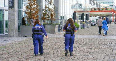 Enforcement officers on a street in Rotterdam 
