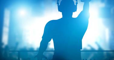 A DJ playing in a club